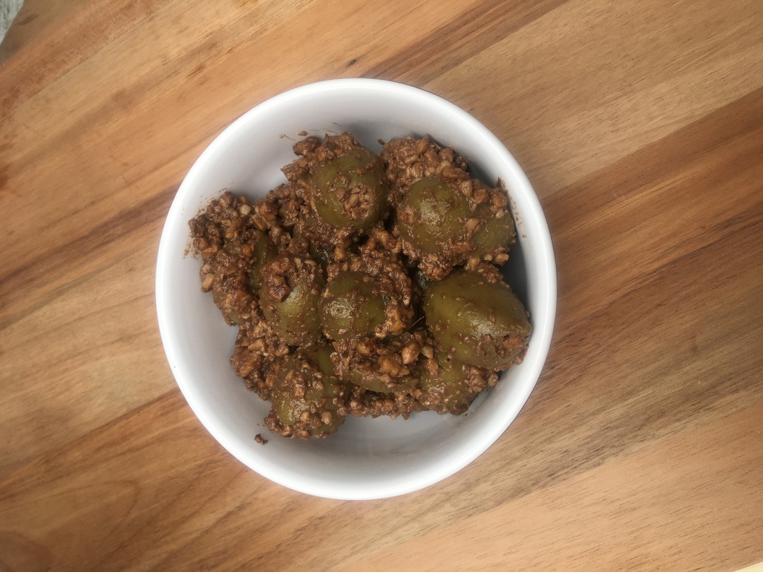 Persian marinated olives in pomegranate-and-walnut dressing